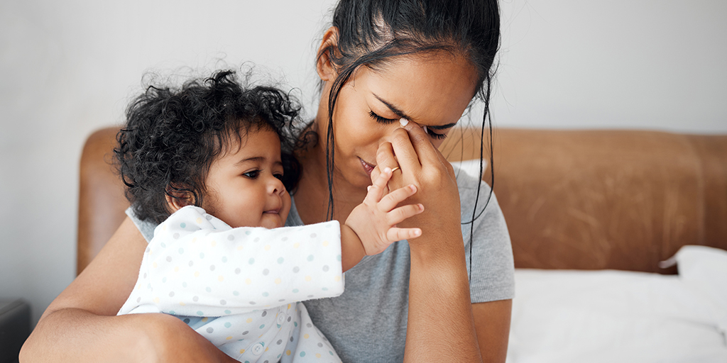 mother experiencing perinatal and postpartum depression